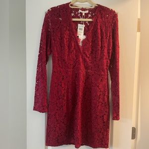 Long sleeve lace cocktail gown. NWT.